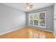 Bedroom with bamboo flooring, neutral walls, natural light and a ceiling fan at 3744 Leela Palace Way, Fort Mill, SC 29708