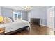 Bedroom featuring wood floors, a window, and a dresser at 3744 Leela Palace Way, Fort Mill, SC 29708