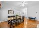 Open dining room boasts hardwood floors, neutral colors, and plenty of natural light at 3744 Leela Palace Way, Fort Mill, SC 29708