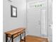 Home entryway featuring hardwood floors and ample natural light from the front door at 3744 Leela Palace Way, Fort Mill, SC 29708