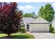 Inviting single-story home with a well-maintained lawn, mature tree, and attached two car garage at 3744 Leela Palace Way, Fort Mill, SC 29708