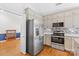 Modern kitchen with stainless steel appliances and granite countertops, blending functionality with style at 3744 Leela Palace Way, Fort Mill, SC 29708