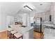Open kitchen layout with large island, granite countertops, and stainless steel appliances at 3744 Leela Palace Way, Fort Mill, SC 29708