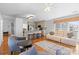 Open-concept living space featuring a kitchen, with an adjacent living room at 3744 Leela Palace Way, Fort Mill, SC 29708