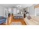 Open-concept living area with seating and kitchen area, designed for comfort at 3744 Leela Palace Way, Fort Mill, SC 29708