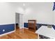 Office space showcasing wainscoting, natural light, and wood laminate flooring at 3744 Leela Palace Way, Fort Mill, SC 29708