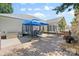 Spacious patio with a stone fireplace, relaxing swing, and a dining set under a gazebo at 3744 Leela Palace Way, Fort Mill, SC 29708