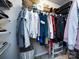 Walk-in closet with ample hanging space and shelving for organized storage of clothes and accessories at 4012 Martele Dr, Mint Hill, NC 28227