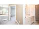 Bright bathroom featuring a double sink vanity with ample counter space and a large mirror at 4047 Rainbow Hills Dr, Hickory, NC 28602