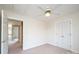 Bedroom offering natural light, neutral carpet and a ceiling fan at 4047 Rainbow Hills Dr, Hickory, NC 28602