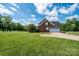 Beautiful home with a spacious yard, featuring a convenient two-car garage and a classic brick exterior at 4047 Rainbow Hills Dr, Hickory, NC 28602
