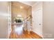 Bright foyer with hardwood floors, high ceilings, and a staircase leading to the upper level at 4047 Rainbow Hills Dr, Hickory, NC 28602