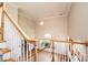 Foyer view from the staircase, offering soaring ceilings and natural light from a large window at 4047 Rainbow Hills Dr, Hickory, NC 28602
