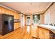 Kitchen with black appliances, hardwood floors, and breakfast bar at 4047 Rainbow Hills Dr, Hickory, NC 28602