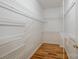 A walk-in closet with hardwood floors and wire shelving for ample storage space at 4047 Rainbow Hills Dr, Hickory, NC 28602