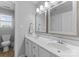 Bathroom featuring a double sink vanity, tile floors, and neutral walls at 502 Fly Fisher Dr, Salisbury, NC 28147