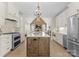 Spacious kitchen featuring an island, stainless steel appliances, and custom cabinetry at 502 Fly Fisher Dr, Salisbury, NC 28147