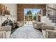 Bright living room with a stone accent wall, access to outdoor living, and comfortable seating at 502 Fly Fisher Dr, Salisbury, NC 28147