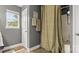 Well-lit bathroom with decorative shower curtain, and coordinated accessories at 5057 Sedgefield Dr, Lancaster, SC 29720
