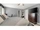 Comfortable bedroom with a ceiling fan, a dresser with a television, and a door leading to an ensuite bathroom at 5057 Sedgefield Dr, Lancaster, SC 29720