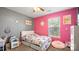 Bedroom with gray and pink walls, carpet flooring, a ceiling fan, and pink accents at 5057 Sedgefield Dr, Lancaster, SC 29720