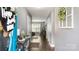 Inviting entryway with modern decor, wood floors, and view into the living room at 5057 Sedgefield Dr, Lancaster, SC 29720