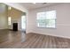 Sunlit dining room is adjacent to the living room, offering great natural light and convenient access to the outdoors at 521 Ellingsworth Ln, Charlotte, NC 28214