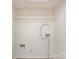 Utility room featuring a wire shelf, and hookups for a washer and dryer at 521 Ellingsworth Ln, Charlotte, NC 28214