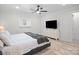 Serene bedroom featuring wood floors, a ceiling fan, recessed lighting, and a dresser at 5219 Farmbrook Dr, Charlotte, NC 28210