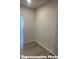 Versatile flex room with neutral walls and flooring providing ample space for various uses at 6209 Busch Way, Midland, NC 28107