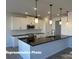 Well-equipped kitchen featuring stainless steel appliances, pendant lighting, and modern cabinetry at 6209 Busch Way, Midland, NC 28107