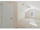 Expansive bonus room with neutral walls, a ceiling fan, and a bright window at 6724 Long Nook Ln, Indian Trail, NC 28079