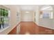 Dining area with french doors, crown molding, and hardwood floors at 6724 Long Nook Ln, Indian Trail, NC 28079