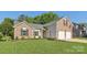 Charming brick and vinyl home with well maintained lawn at 6724 Long Nook Ln, Indian Trail, NC 28079