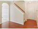 Foyer with hardwood floors, staircase, and a view of the front door and closet at 6724 Long Nook Ln, Indian Trail, NC 28079