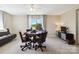 Bonus room with ceiling fan, picture window, and poker table set at 7700 Ninth Fairway Ln, Mint Hill, NC 28227