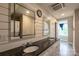 Modern bathroom with double vanity, granite countertops, and stylish finishes at 7740 Freeze Rd, Kannapolis, NC 28081