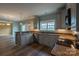 Modern kitchen with stainless steel appliances, granite countertops, and custom cabinetry at 7740 Freeze Rd, Kannapolis, NC 28081