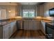 Modern kitchen with stainless steel appliances, granite countertops, and custom cabinetry at 7740 Freeze Rd, Kannapolis, NC 28081