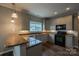 Well-equipped kitchen with granite counters, stainless steel appliances, and pendant lighting at 7740 Freeze Rd, Kannapolis, NC 28081