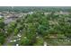 A captivating aerial view highlights the approximate lot lines and mature trees in a neighborhood setting at 93 34Th Street Nw Ct, Hickory, NC 28601