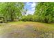Large backyard with a shed, covered parking, and plenty of open space at 93 34Th Street Nw Ct, Hickory, NC 28601