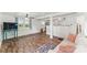 Bright living room featuring hardwood floors, a large window, and neutral tones at 93 34Th Street Nw Ct, Hickory, NC 28601