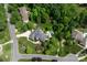 Aerial view of the estate home, highlighting the meticulously landscaped grounds and private backyard area at 1001 Medinah Ct, Waxhaw, NC 28173