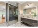 Modern bathroom with glass-enclosed shower, sleek vanity, and contemporary fixtures at 1001 Medinah Ct, Waxhaw, NC 28173