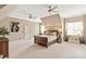 Expansive bedroom featuring a vaulted ceiling, natural light, and neutral paint at 1001 Medinah Ct, Waxhaw, NC 28173