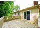 Wooden deck with sliding glass door and view of the back yard and mature trees at 1018 Autumn Ln, Hickory, NC 28602