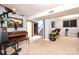 Spacious basement featuring an exercise machine and piano at 1018 Autumn Ln, Hickory, NC 28602