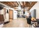 Spacious unfinished basement with water heater, workbench, and utility access, perfect for storage or projects at 1018 Autumn Ln, Hickory, NC 28602