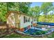 View of the house, carport and landscaping showing a charming home at 1018 Autumn Ln, Hickory, NC 28602